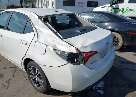 2018 Toyota Corolla Le z USA, uszkodzony, nr VIN 5YFBURHE6JP804554